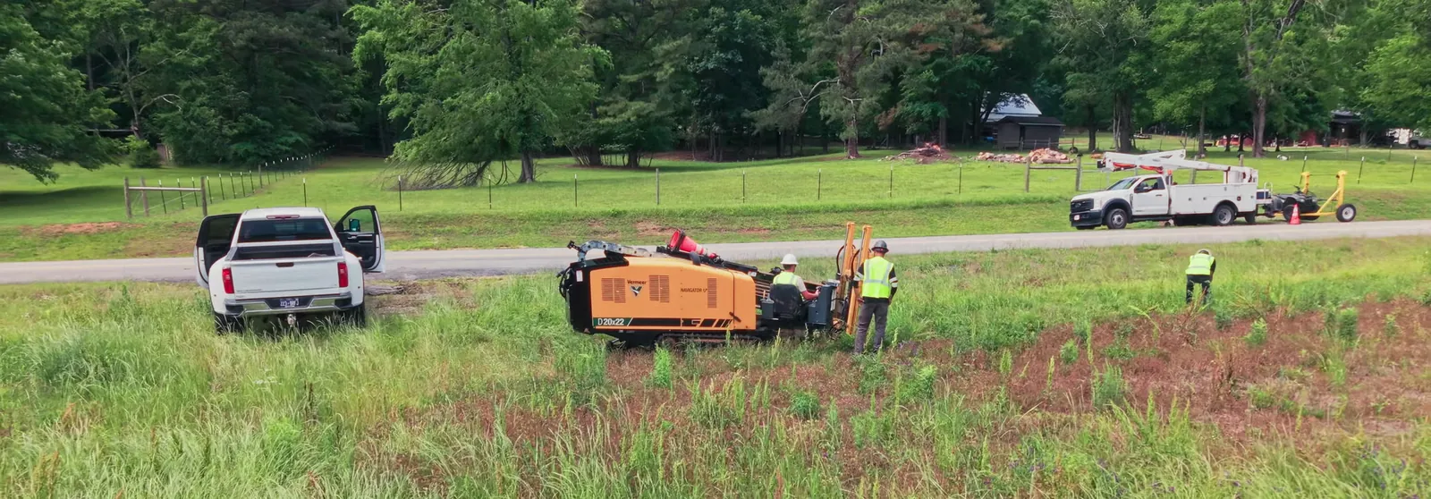 NextGen Fiber drill crew and Vermeer directional drill on a roadside job site